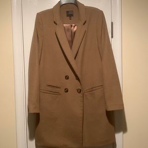 Beautiful wool double breasted knee length coat.